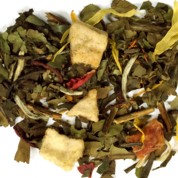 Close-up of a mix of dried tea leaves on a white background