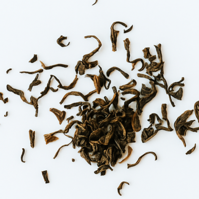Tea leaves on a white background with 'Chapter One: Breakfast' text