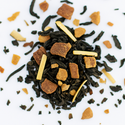 Tea leaves with visible branding on a white background