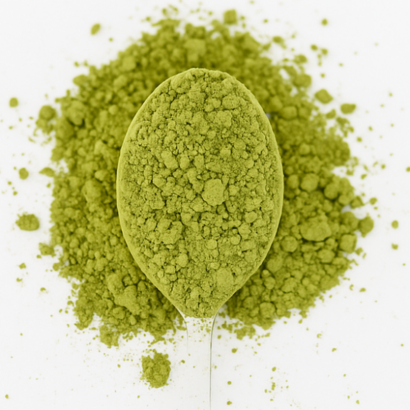 Green powder in a spoon with 'Leaf & Legend' text on a white background